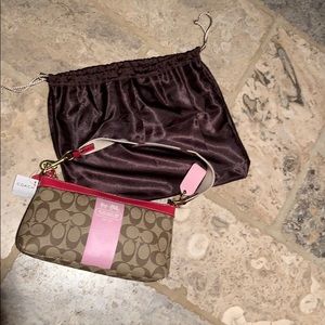 NWT coach pocketbook.